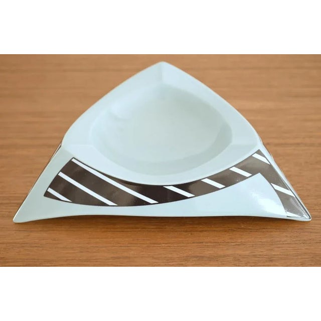 Memphis ashtray from the 1980s by Dorothy Hafner for Rosenthal Studio Line. The ashtray in triangular shape is in very...