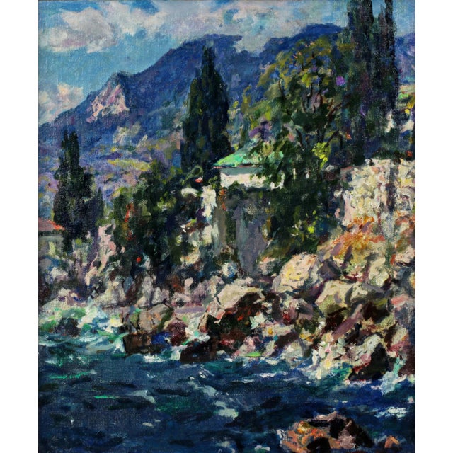 A delightful Crimean sketch with a view of the coastal stones, buildings and mountains on a hot summer afternoon. In the...