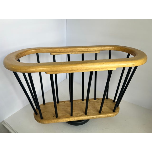 Sculptural, functional, and effortlessly cool—this Mid-Century Modern magazine rack is the kind of piece that quietly...