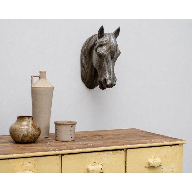 Antique zinc horse head dating from the 1900s, beautifully sculpted. The details of the face and mane give it a striking...