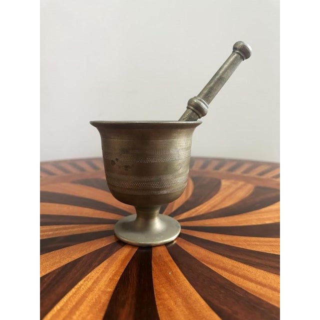 Vintage Brass Mortar and Pestle w/Distinctive Pedestal Base and Grooved Bands. The pestle is 7.2in. long.