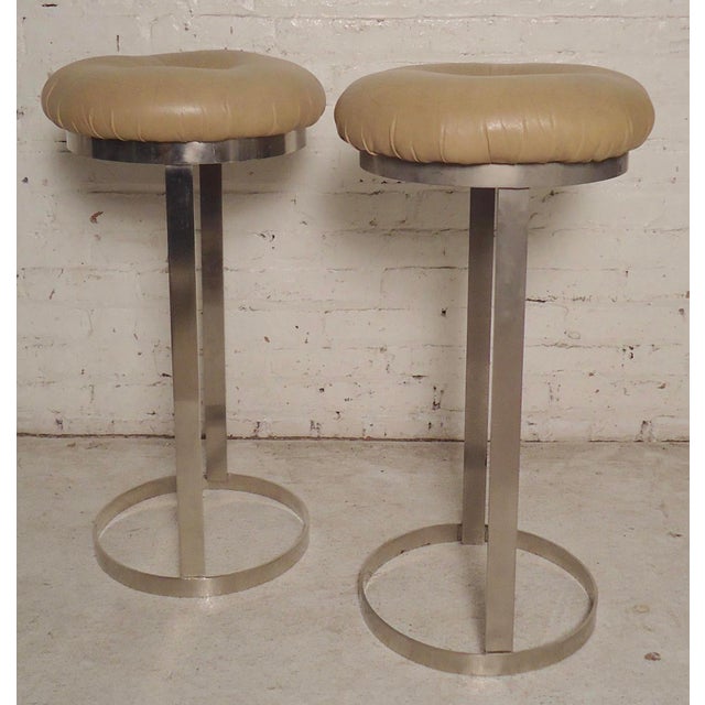 Vintage modern stools in the style of Milo Baughman with chrome bases and tufted seats. (Please confirm item location - NY...
