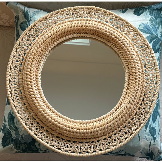 Vintage Round Handwoven Rattan Mirror With Openwork Knot Motif CIRCA: 1970s ORIGIN/MAKER'S MARK: Made in Hong Kong sticker...