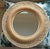 Vintage Round Handwoven Rattan Mirror With Openwork Knot Motif CIRCA: 1970s ORIGIN/MAKER'S MARK: Made in Hong Kong sticker...