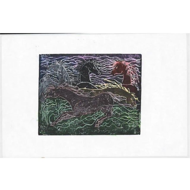 Unsigned linocut of horse frolicking.