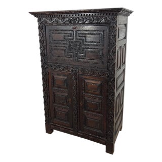 19th Century Baroque Oak Fall-Front Cabinet with Deep Carved Decoration For Sale