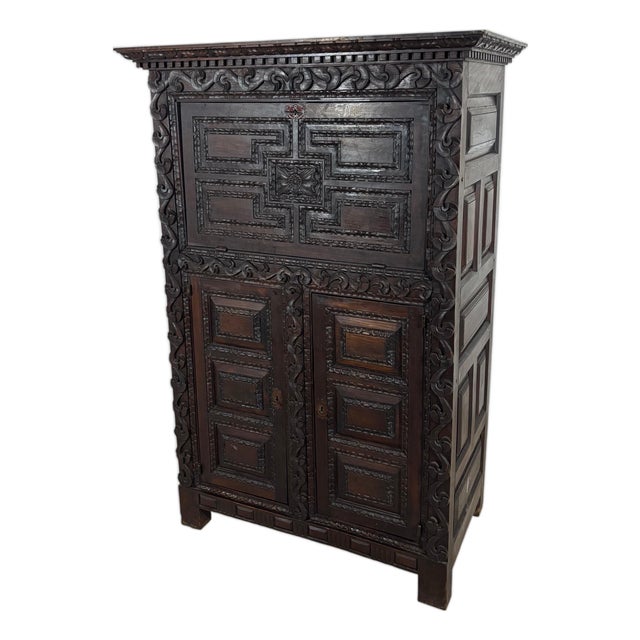 19th Century Baroque Oak Fall-Front Cabinet with Deep Carved Decoration For Sale