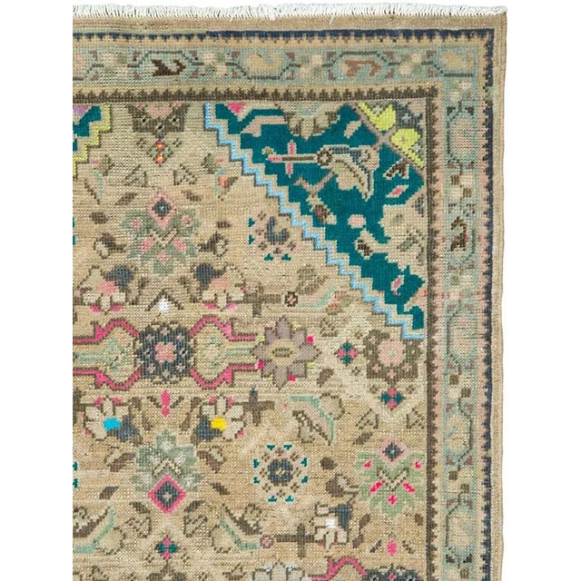 A vintage Persian hamadan rug from the mid-20th century. Hamadan town and the surrounding weaving area of about 120...