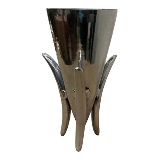 Mid 20th Century Vase of Heavy Cast Aluminum Supported by Three Elegant Curved Legs. For Sale