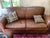 Bought from Pottery Barn in early 1990s . This is the classic Manhattan 1930s style leather club sofa with a pullout...