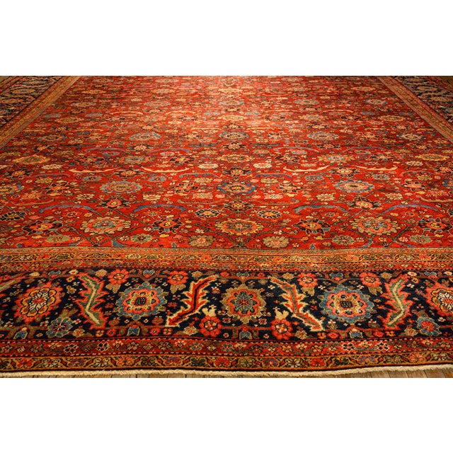 Textile 1890s Antique Red Ground Overscale Botanical Knotted Wool Persian Sultanabad Rug For Sale - Image 7 of 9