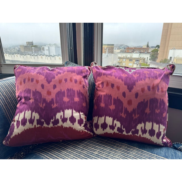 Custom pair of 20" pillows covered in Schumacher "Samarkand Ikat" in color ruby. These pillows have tapered corners to...
