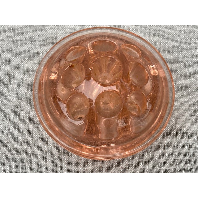 Vintage domed pink Depression glass footed flower pin frog. No makers mark. Has wear from age, use. It measures 3 3/8" in...