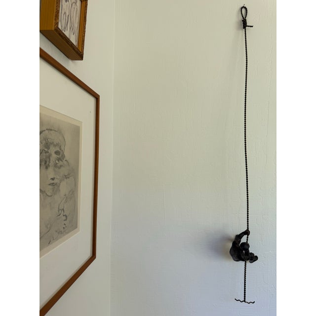 Black Vintage Modernist Cast Metal Hanging Sculpture of a Man Climbing For Sale - Image 8 of 12
