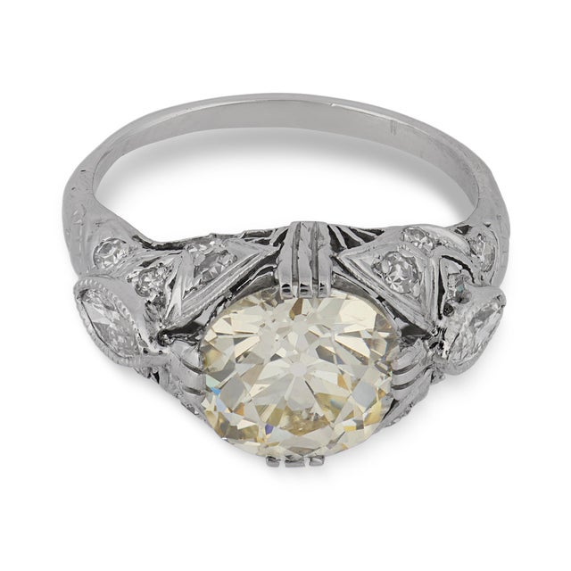 This extraordinary Art Deco engagement ring is a breathtaking testament to antique craftsmanship and bold 1930s design. At...