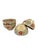 A charming set of four Bat Trang ceramic bowls featuring a colorful hand-painted floral and scrolling vine motif. Each...