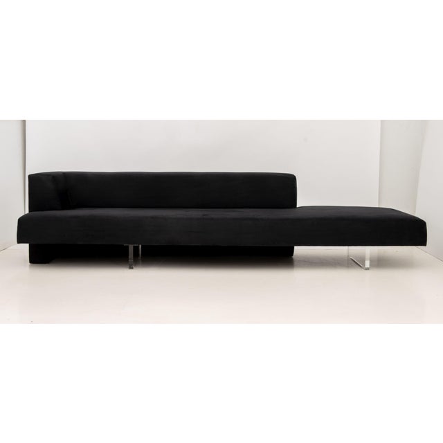 Vladimir Kagan "Omnibus" Black Suede Upholstered Sofa, with lucite base. 28" H x 120" W x 32" D; seat: 17" H. Provenance:...