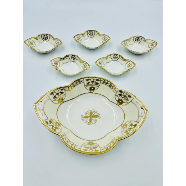 These are Lovely old hand-painted Nippon bowls with pale yellow on white and a lot of Gold Leafing and embellishments....