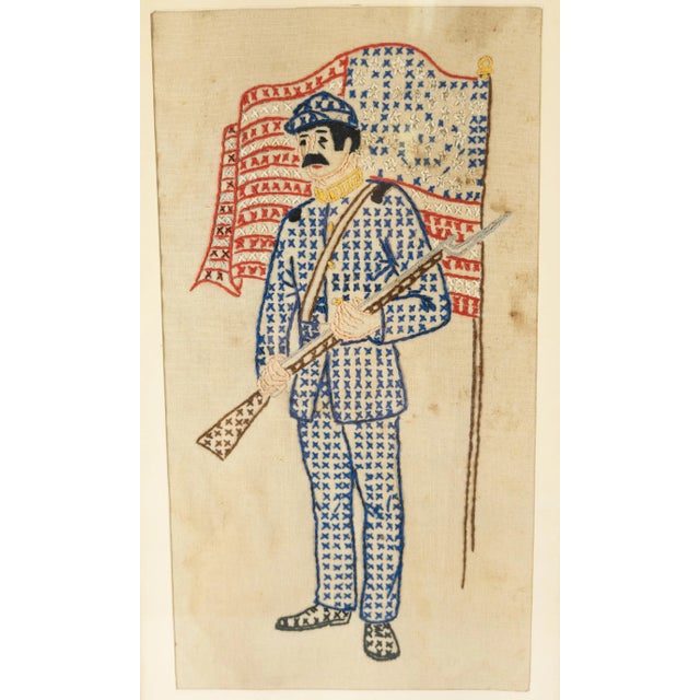 We are selling this interesting needlepoint. This simple needlepoint is of a civil war soldier standing by a flag, very...