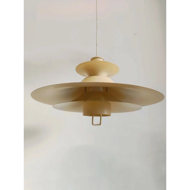 Vintage Danish pendant lamp from the 1960s in white metal with layered slats and a minimalist design, perfect for elegant...