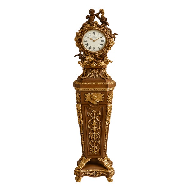 Grand French Louis XVI-Inspired Pedestal Clock – Brown Finish With Gold Leaf, Bronze Details & Sculpted Cherub Crest For Sale