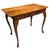 An evocative example of traditional provincial furniture, this antique writing table is distinguished by its beautifully...