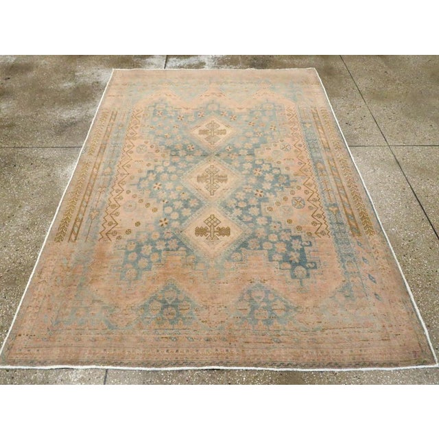 A vintage Persian Afshar accent rug handmade during the Mid-20th century. Measures: 5' 2" x 7' 4"