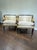Elegant pair of vintage French Empire style swan tub chairs with dramatic sculptural swan arms and refined Hollywood...