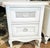 Shabby and still chic, a pair of French country style L XV nighstands in a chippy white finish, solid pegged construction...