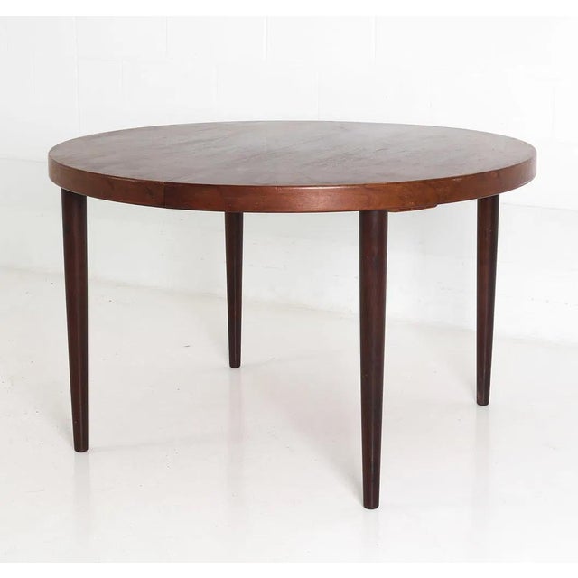 A very nice small mid century modern Danish rosewood dining table. Table is well made and quite attractive. Perfect for a...