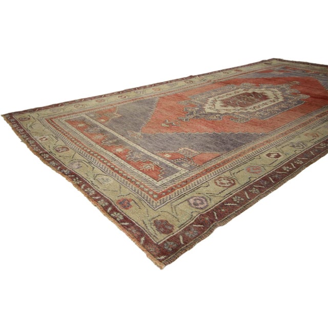 Vintage Turkish Oushak Gallery Rug with Tribal Pattern, Wide Hallway Runner 04'10 x 09'04. This exquisite Oushak rug...