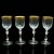 This is a set of four antique wine glasses. A French, gilt decorated stem glass, dating to the Art Deco period, circa...