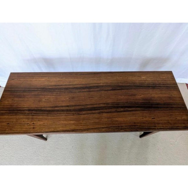 Minimalist Design with Tapered Legs and Rich Wood Grain. Some very minimal marks and wear, easily filled in with stain...