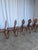Vintage wooden dining chairs in traditional Tyrolean (Alpine) style. with a shaped backrest and characteristic heart cut-...