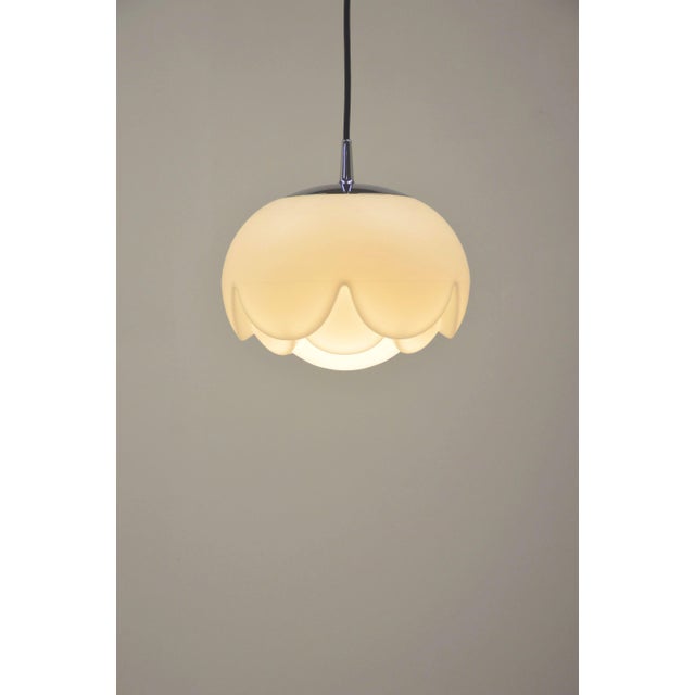 Beautiful ceiling lamp from the 70s called ' Artichoke ' from the famous brand Peill & Putzler . This lamp is crafted from...