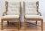 Fretwork rattan wingback chair pair featuring wonderful detail to wings and arms. Stretchers to legs add support. Warm...