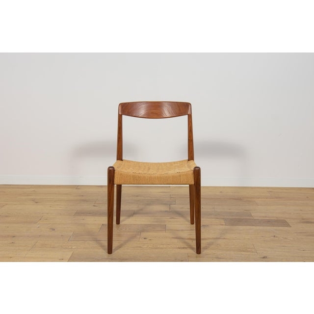 Chair made in Denmark in the 1960s. The chair frame is made of teak wood with an interesting shape. The frame has...