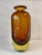 A particularly beautiful two-tone, mouth-blown vase in yellow and amber colors. This piece has an attribution mark, I am...