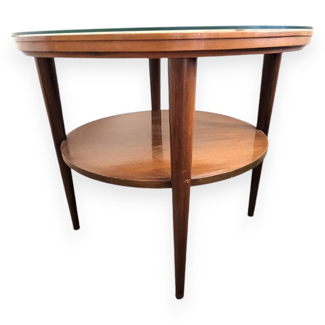 This is an extremely rare Danish Modern walnut table inlaid with nine hand-painted tiles by noted Dutch artist J. Warner...