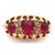 18 Karat Yellow Gold Three Stone Ruby Ring With Diamond Accents 0.04 total diamond weight. Size 5.5 2.94 grams total weight.