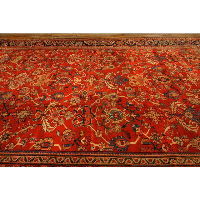 Textile 1890s Antique Warm Red Ground Floral Knotted Wool Persian Sultanabad Carpet Rug For Sale - Image 7 of 8