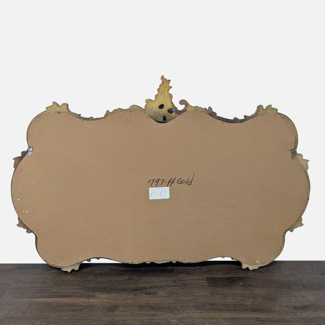 This is a totally dramatic and quite large Italian style Rococo horizontal mirror. It is called a lover's mirror because...