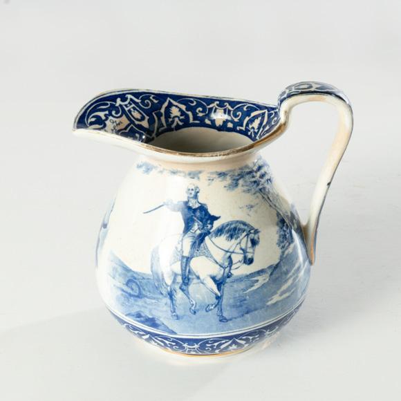 Buffalo Pottery Blue and White George Washington Mount Vernon Transfer ware Pitcher.. Features scenes of Washington on...