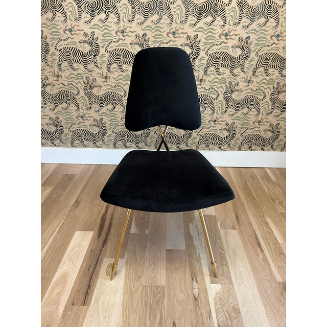 Jonathan Adlers signature Maxime dining chair in great shape. Has a solid brass frame with an interesting criss-crossed...