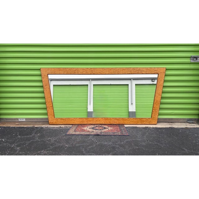 This is a very cool mirror. We cannot find anything similar. It is large at 72 3/4 wide. It has angled corners at the top...