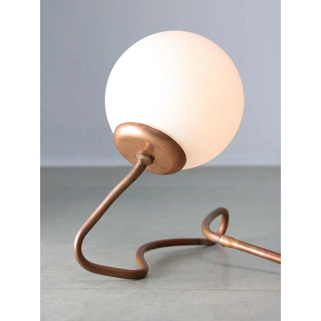 Takes one E14 light-bulb. Opaline glass shade is 12cm wide. European Plug (up to 250V).The wiring of this item may be...