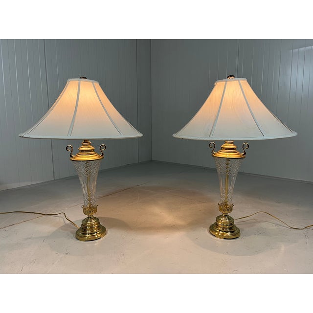 A set of 2 large impressive table lamps by Underwriters Laboraties Inc (marked). Stand made of brass and etched crystal,...