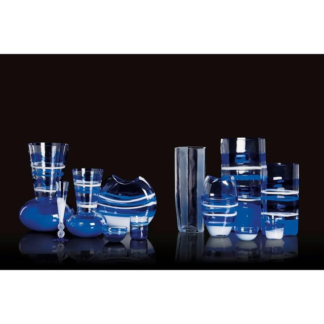 Arco Carlo Moretti contemporary Murano mouth blown glass vase in blue, white and clear glass. Carlo Moretti: An artisan...