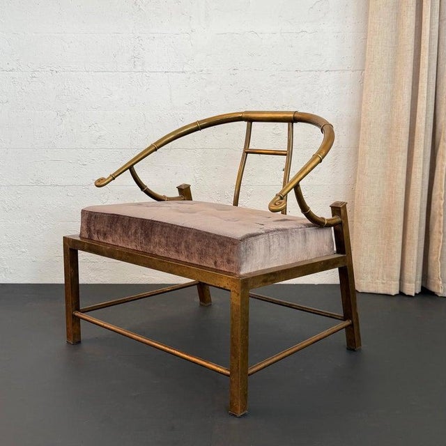 This glamorous Hollywood Regency lounge chair is the "Emrpress" by Warren Lloyd for Mastercraft circa 1970s. The chair...