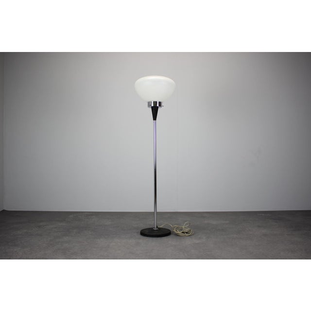 - Minimalistic floor lamp made in Czechoslovakia by Jaroslav Bejvl, in the 1960's, - made of metal, chrome and glass, -...